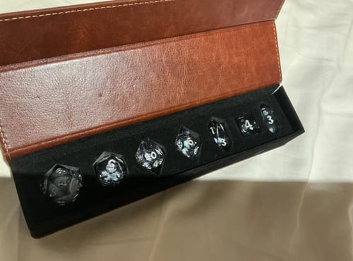 Customer photo review of Black And Silver Glitter Liquid Core Handmade Resin DND Dice Set