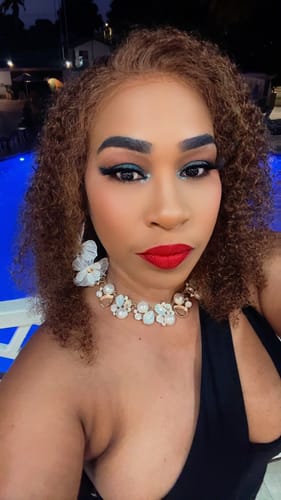 Customer photo review of CurlyMe Wear Go Glueless Highlights Ombre Hair Pre-cut HD Lace Kinky Curly Wig