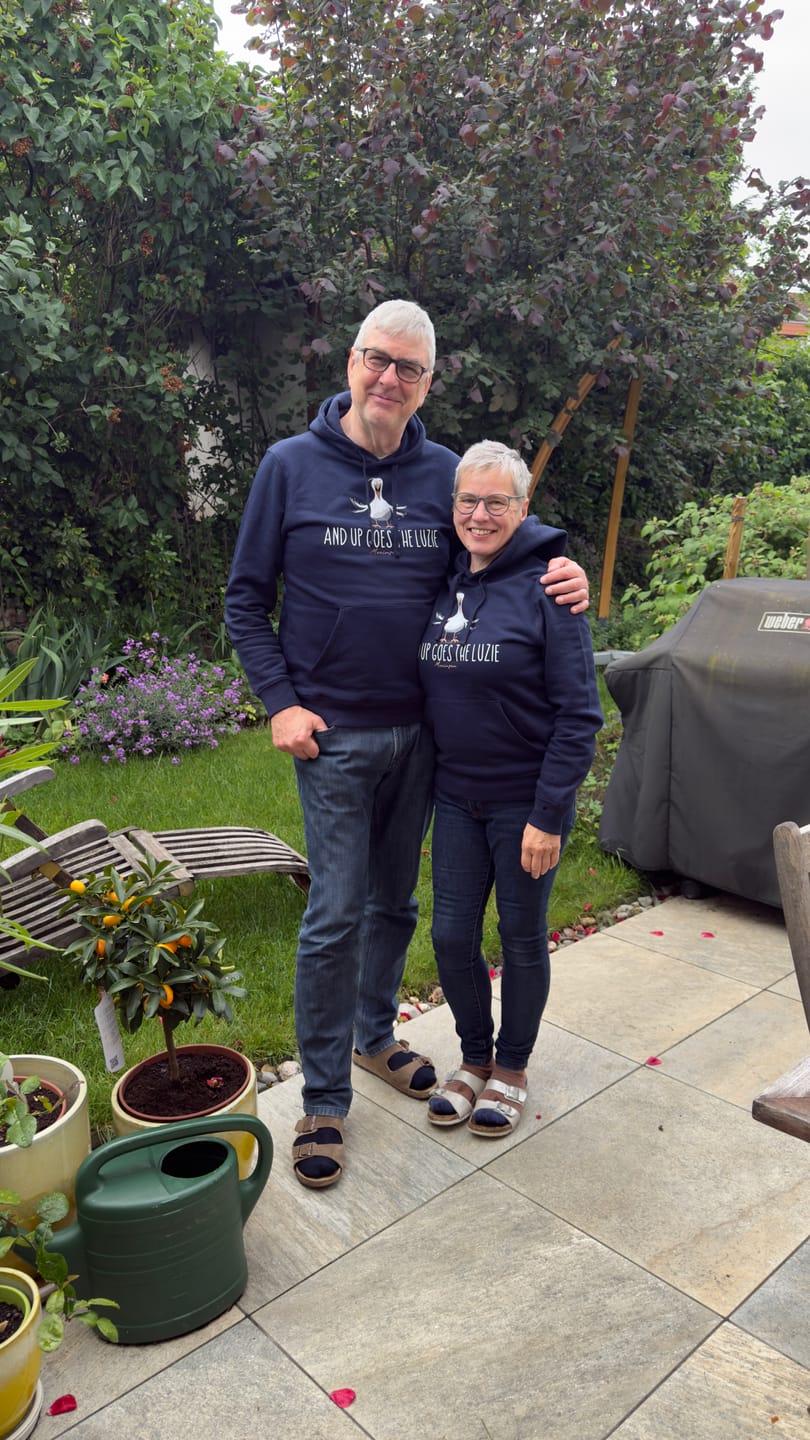 Customer photo review of And up goes the Luzie  · Unisex Bio Hoodie
