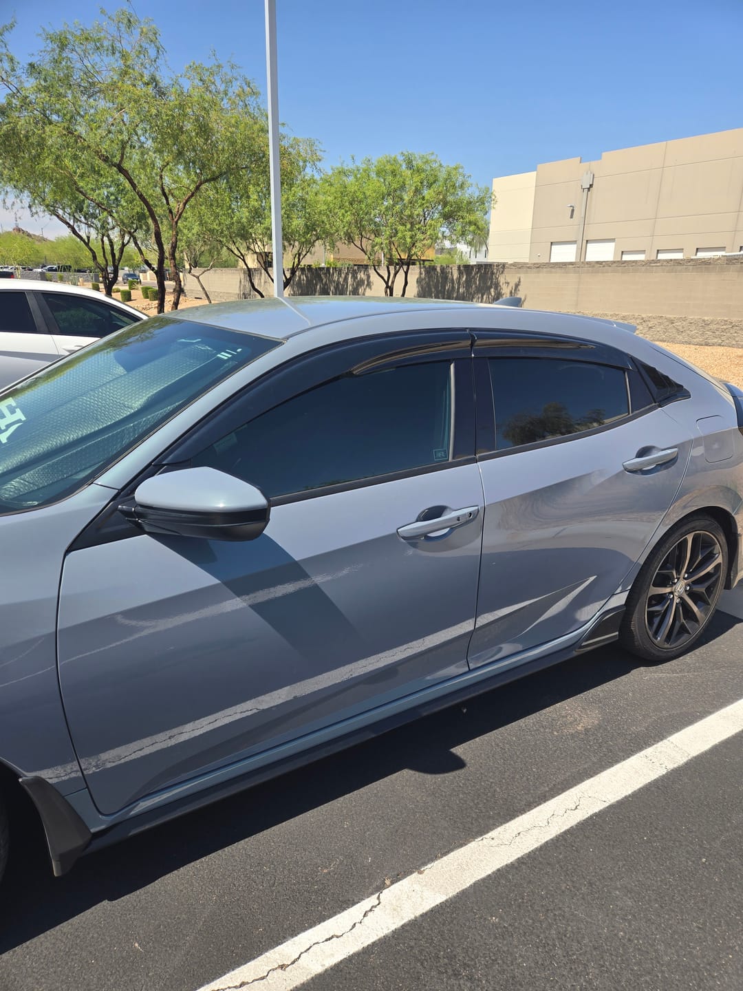 Customer photo review of 2016-21 Honda Civic Hatchback Tape-On Window Visors Wind Deflectors Rain Guards