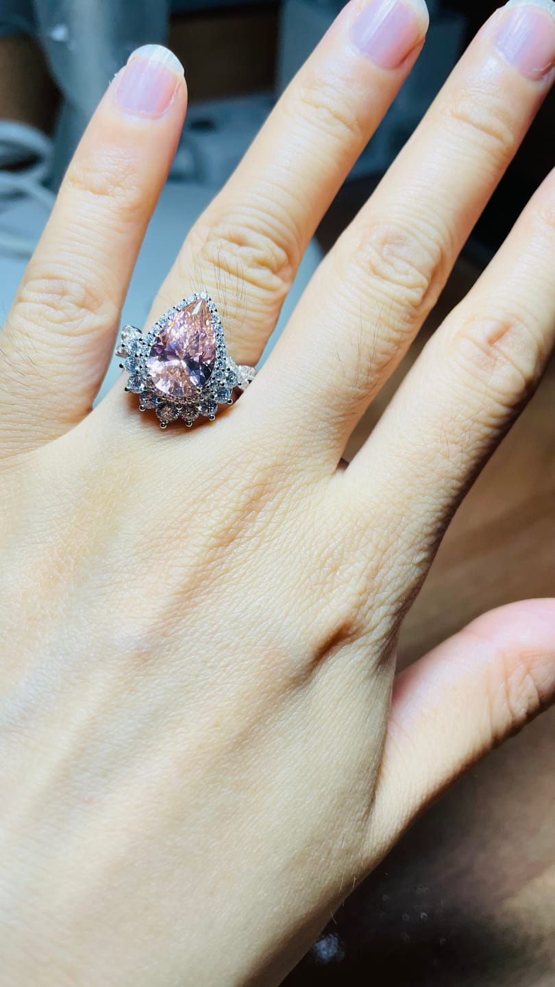 Customer photo review of Vintage 4.0Ct Pink Stone Halo Pear Cut Twist Engagement Ring In Sterling Silver