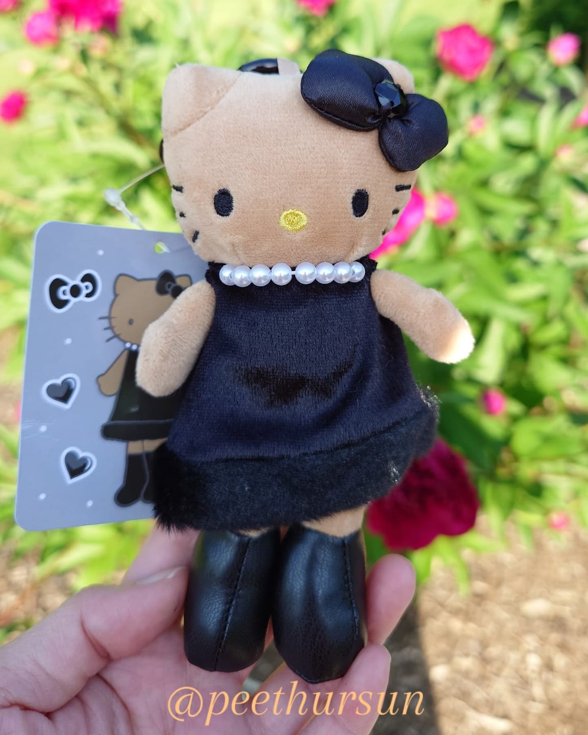 Customer photo review of Hello Kitty Chanel-Style Plush Charm