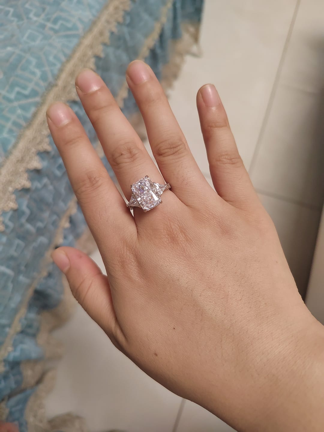 Customer photo review of S925 5.0 Carat Radiant Cut White/Pink Three Stone Engagement Ring With Hidden Halo For Everyday Wear