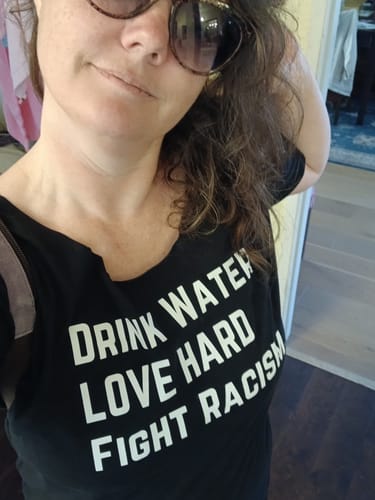 Customer photo review of Drink Water Fight Racism Unisex T-shirt