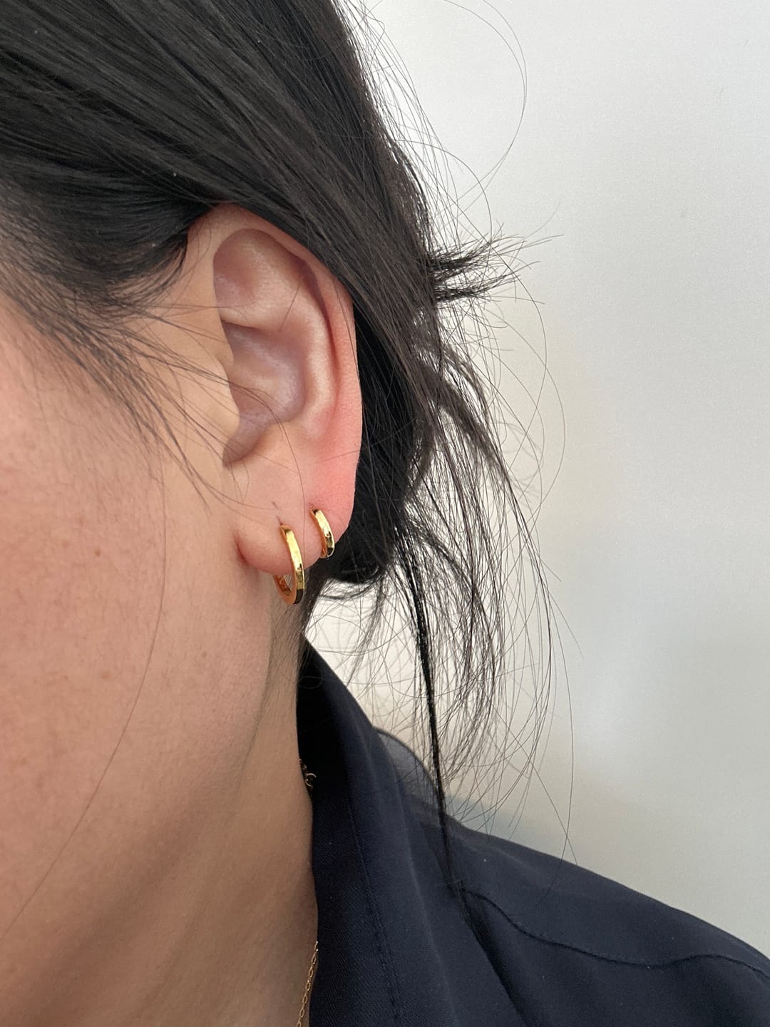 Customer photo review of Ash Micro Huggie Hoop Earrings