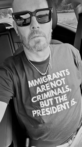 Customer photo review of Immigrants Front English and Back Spanish Unisex T-Shirt