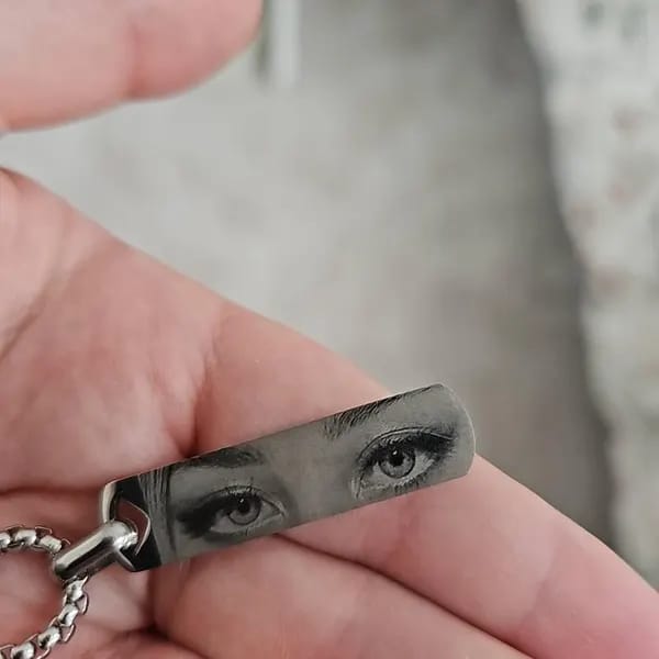 Customer photo review of Custom Engraved Eyes Necklace