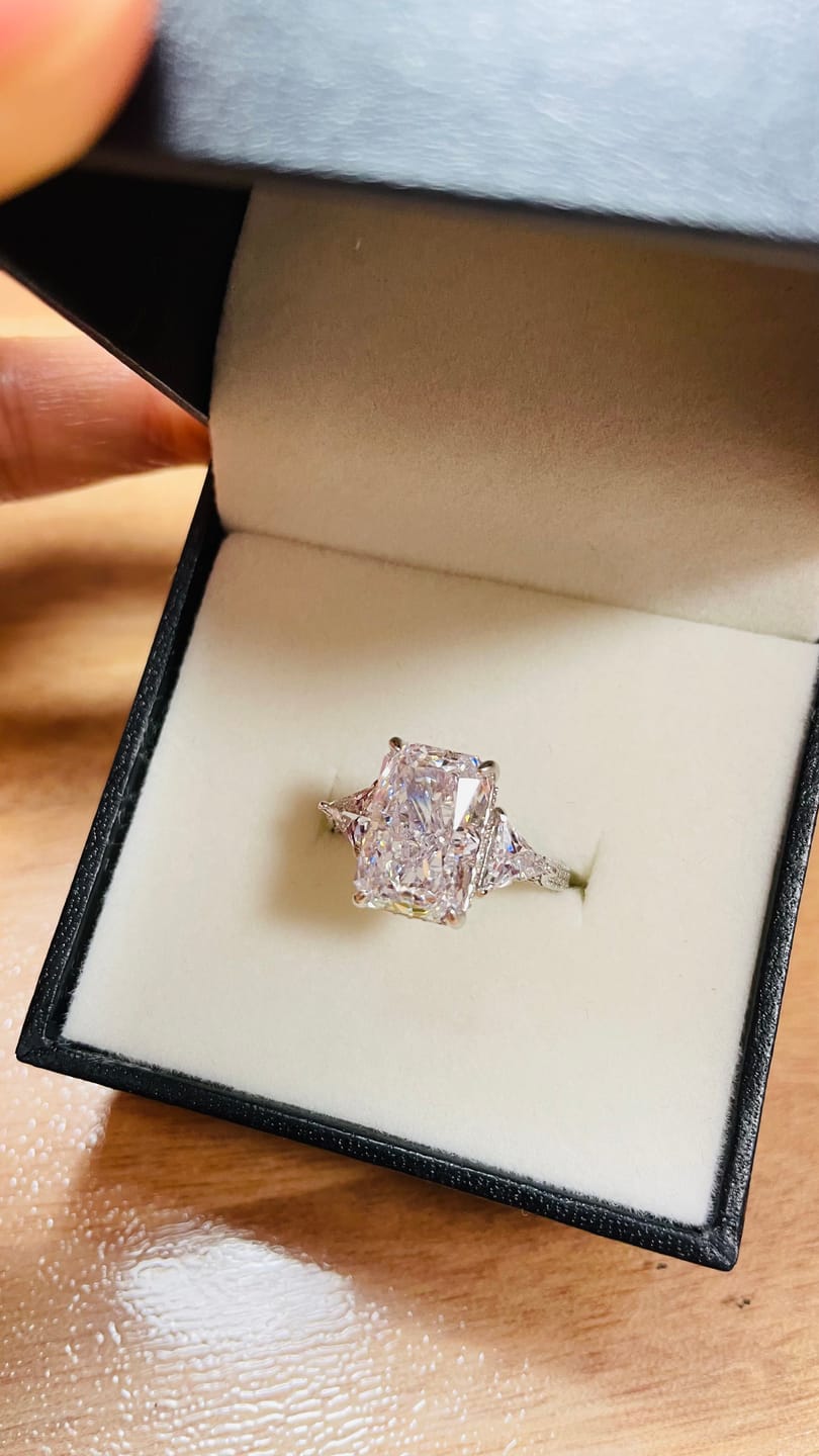 Customer photo review of S925 5.0 Carat Radiant Cut White/Pink Three Stone Engagement Ring With Hidden Halo For Everyday Wear