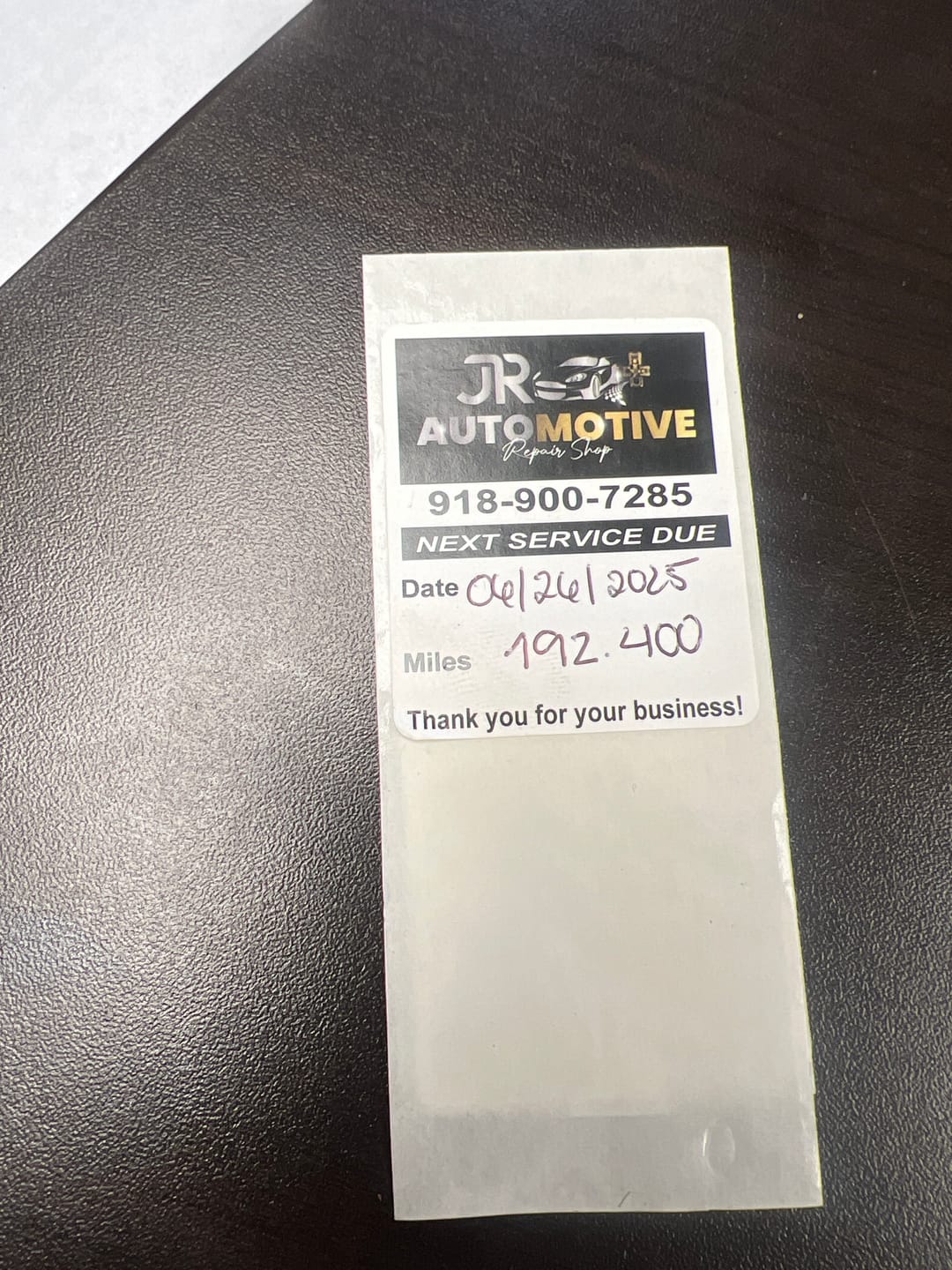 Customer photo review of Custom Oil Change Sticker with Logo