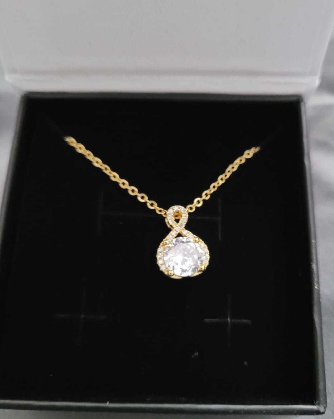 Customer photo review of Alessandra 18k White Gold Plated Infinity Halo Pendant Necklace with Simulated Diamond Crystals