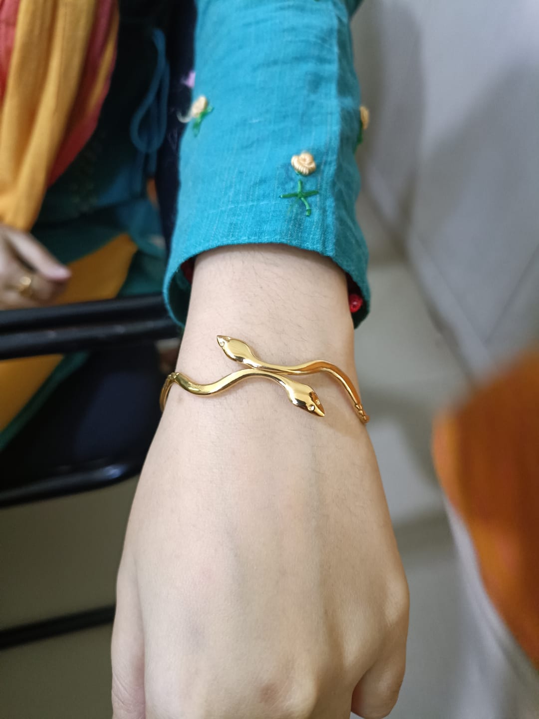 Customer photo review of Minimalist Golden Ripple Snake Bracelet