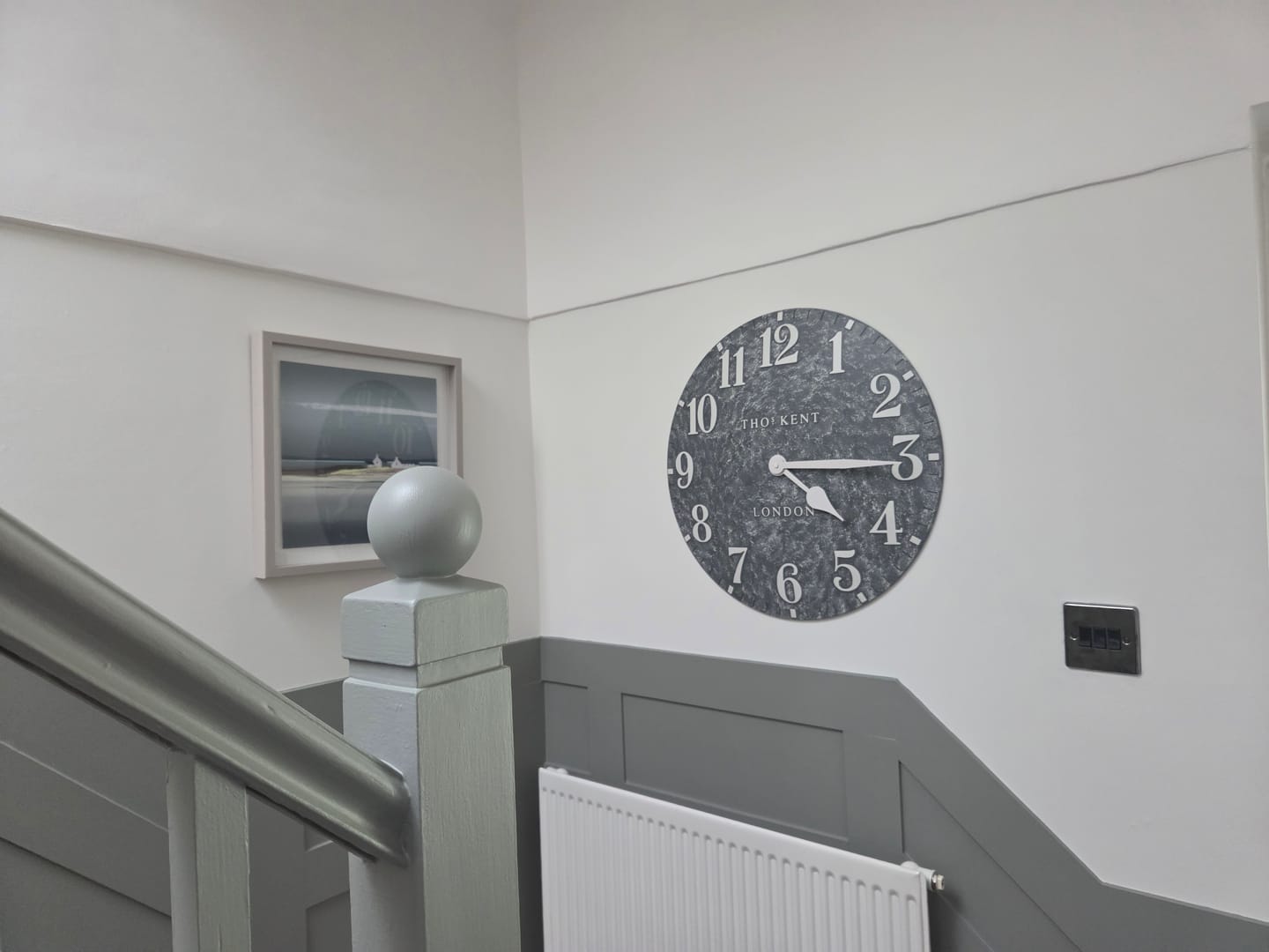 Customer photo review of Thomas Kent London. Arabic Outdoor Wall Clock 20" (51cm) Cement