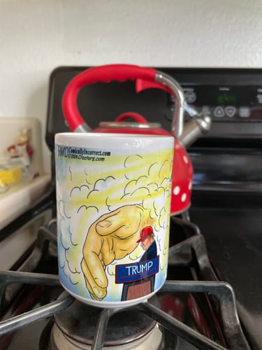 Customer photo review of Mug - God's Hand Saving President Trump Political Cartoon Design