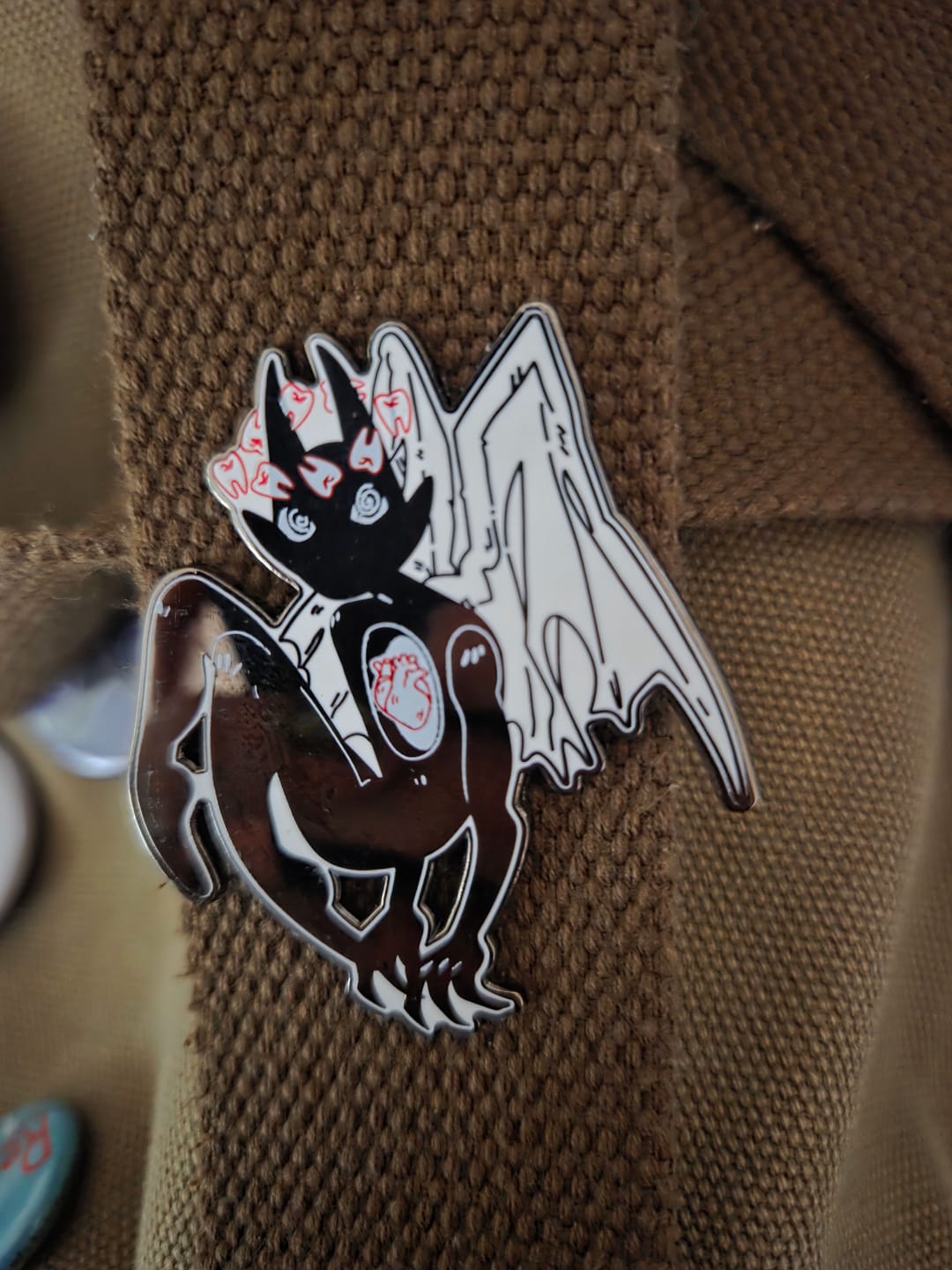 Customer photo review of Gore Angel Enamel Pins