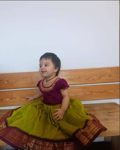 Customer photo review of Green and Wine Kids Langa Blouse – Traditional Zari Border Cotton Dress for Baby Girl