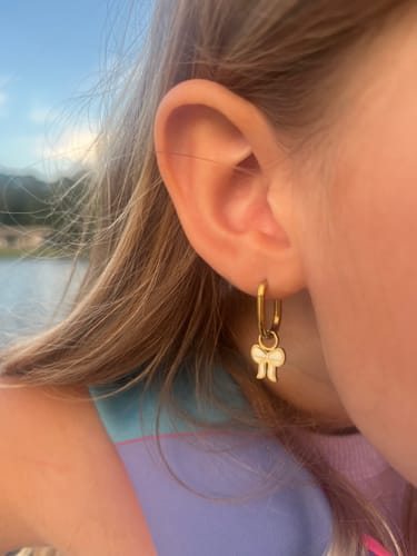 Customer photo review of Cream Bow Charms