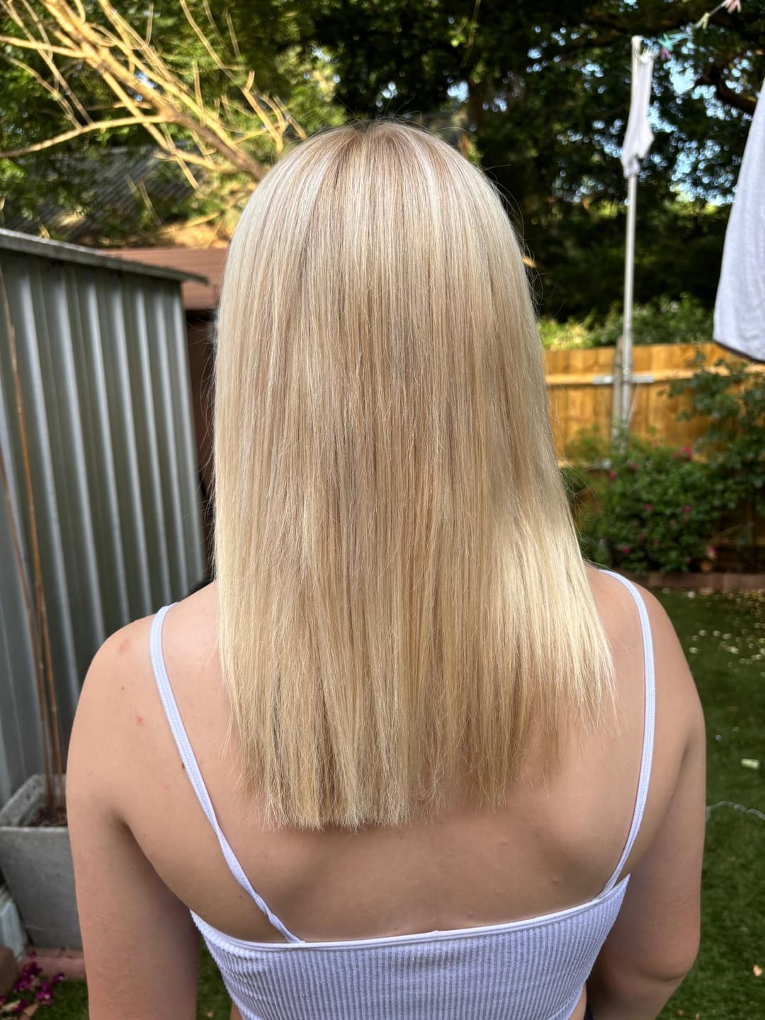 Customer photo review of Stranded 16" One Piece Curly Clip-in Hair Extension - Colour #1001 Polar Star