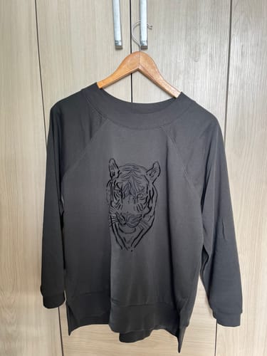 Reseña con foto de un cliente sobre Polerón Tigre Boho