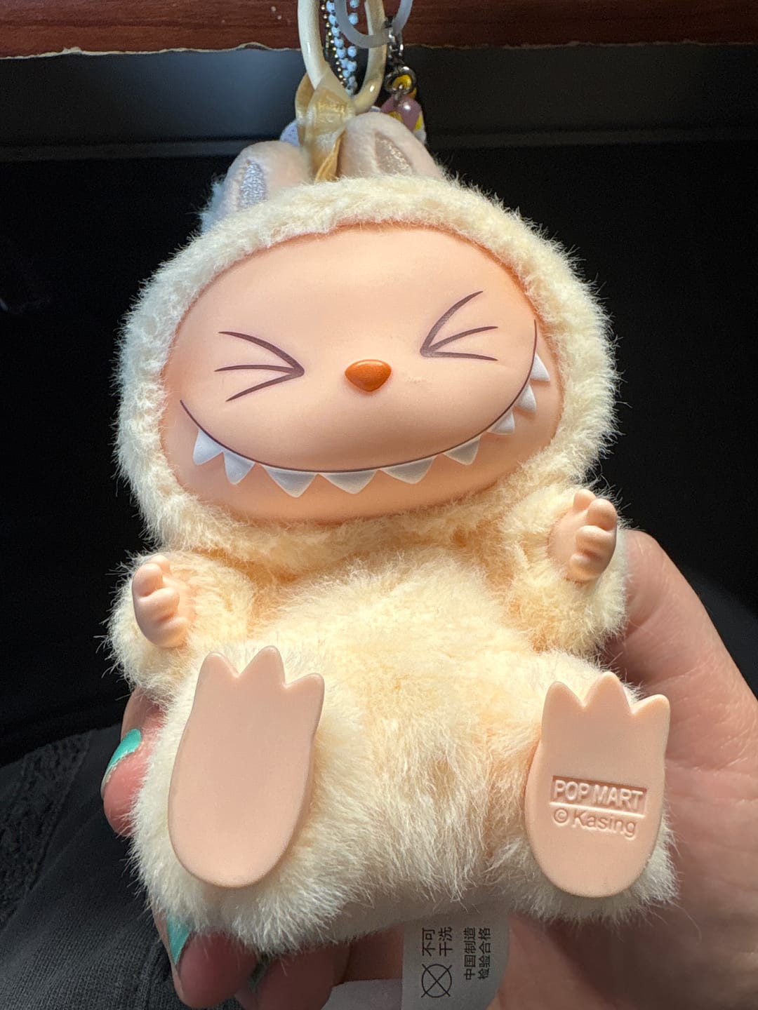 Customer photo review of Pop Mart The Monsters Labubu Have a Seat Vinyl Plush Blind Box