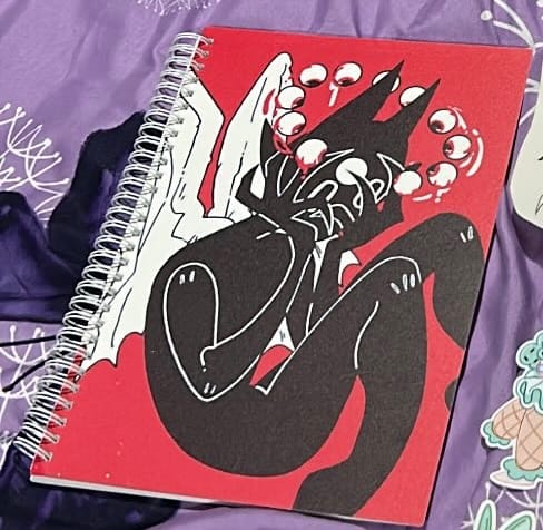 Customer photo review of Angel of the Eyes Large Reusable Sticker Book