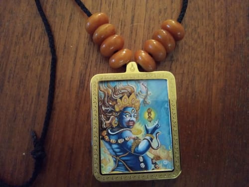 Customer photo review of Vajrapani Ghau Thangka with Locket
