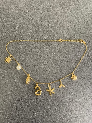 Customer photo review of GOLD OCEAN LETTER NECKLACE