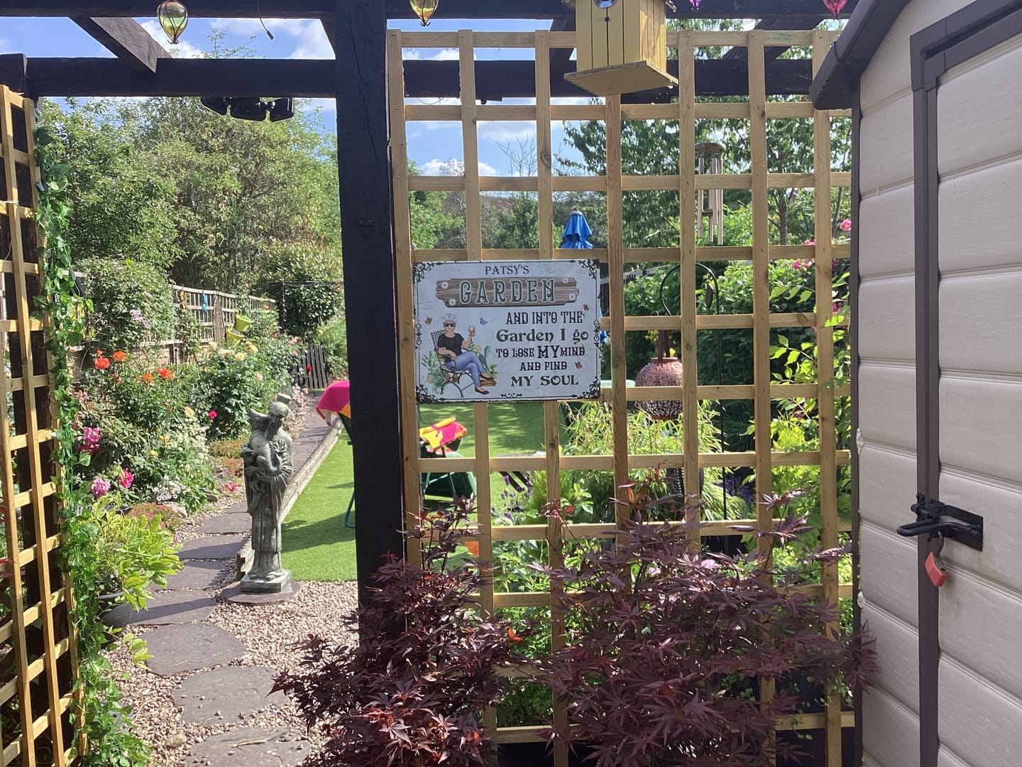 Customer photo review of And Into The Garden I Go Gardening Girl - Garden Sign - Personalized Custom Classic Metal Signs - Gift For Gardeners