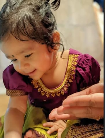Customer photo review of Green and Wine Kids Langa Blouse – Traditional Zari Border Cotton Dress for Baby Girl