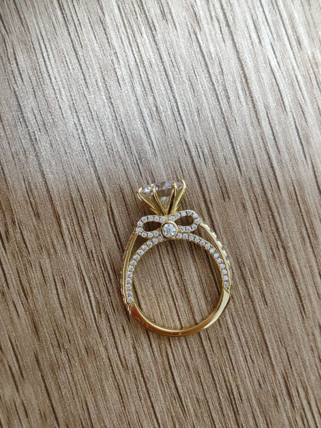 Customer photo review of S925 Moissanite 2.0Ct Round Cut Bow Base Design Engagement Ring For Everyday Wear