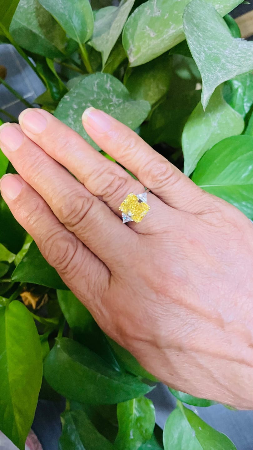 Customer photo review of S925 4.0Ct Radiant & Triangle Cut Yellow Stone Three Stone Engagement Ring In Sterling Silver
