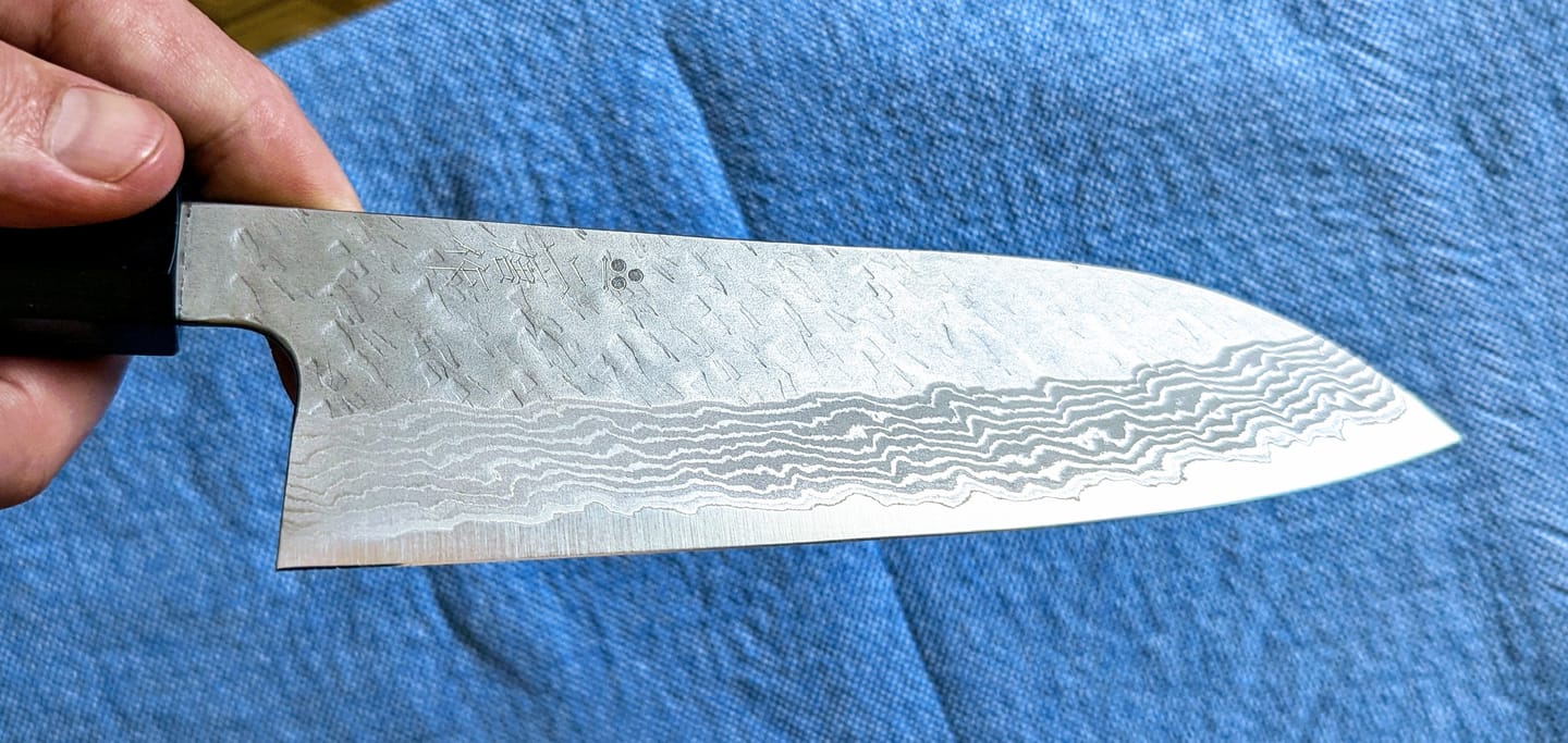 Customer photo review of Nigara Hamono Tsuchime Damascus Santoku 170 mm