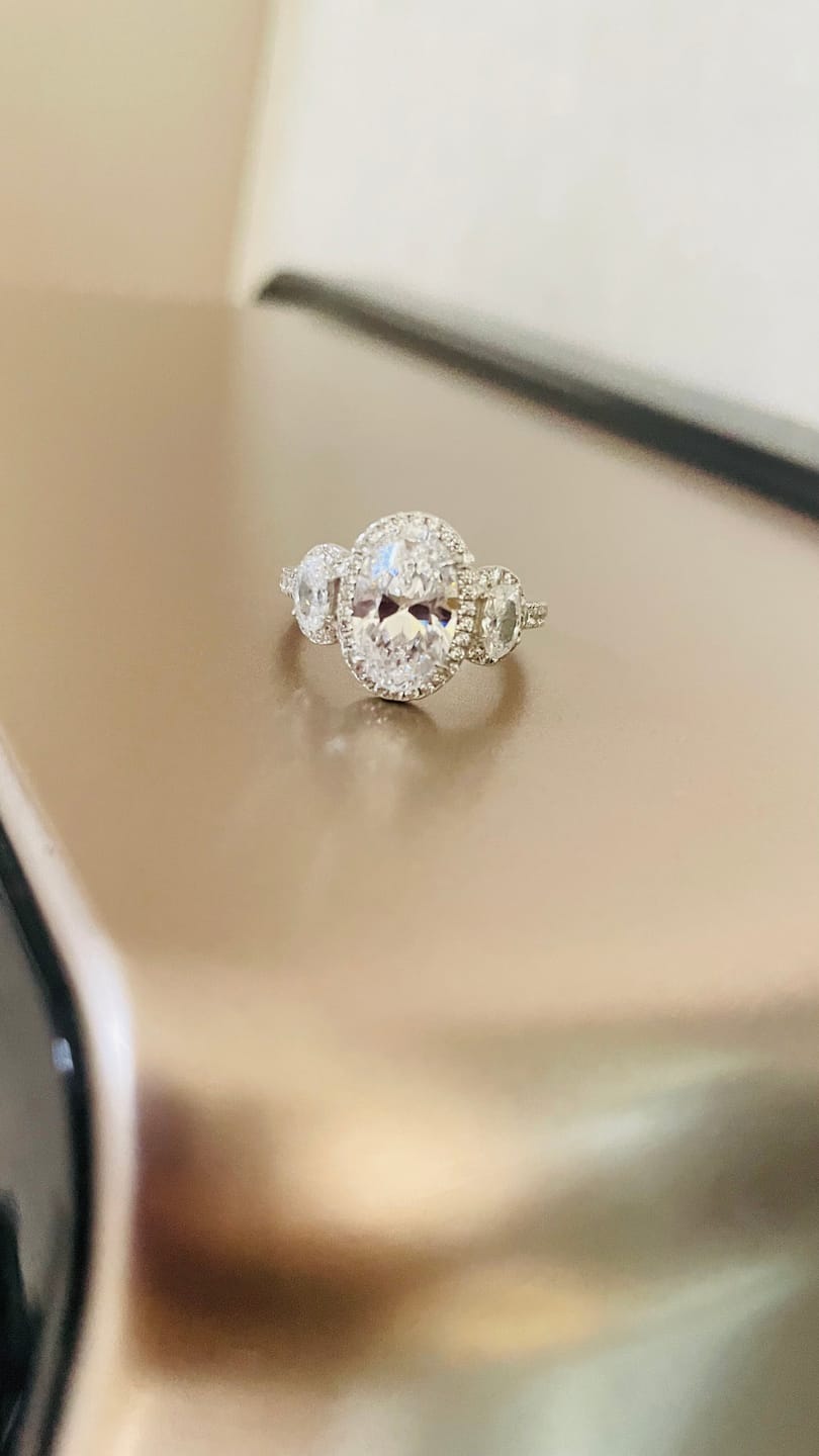 Customer photo review of 2.5Ct Halo Oval Cut Three Stone Engagement Ring Travel Ring In Sterling Silver