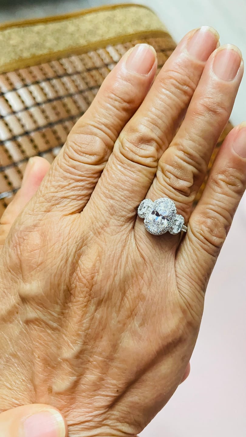 Customer photo review of 2.5Ct Halo Oval Cut Three Stone Engagement Ring Travel Ring In Sterling Silver