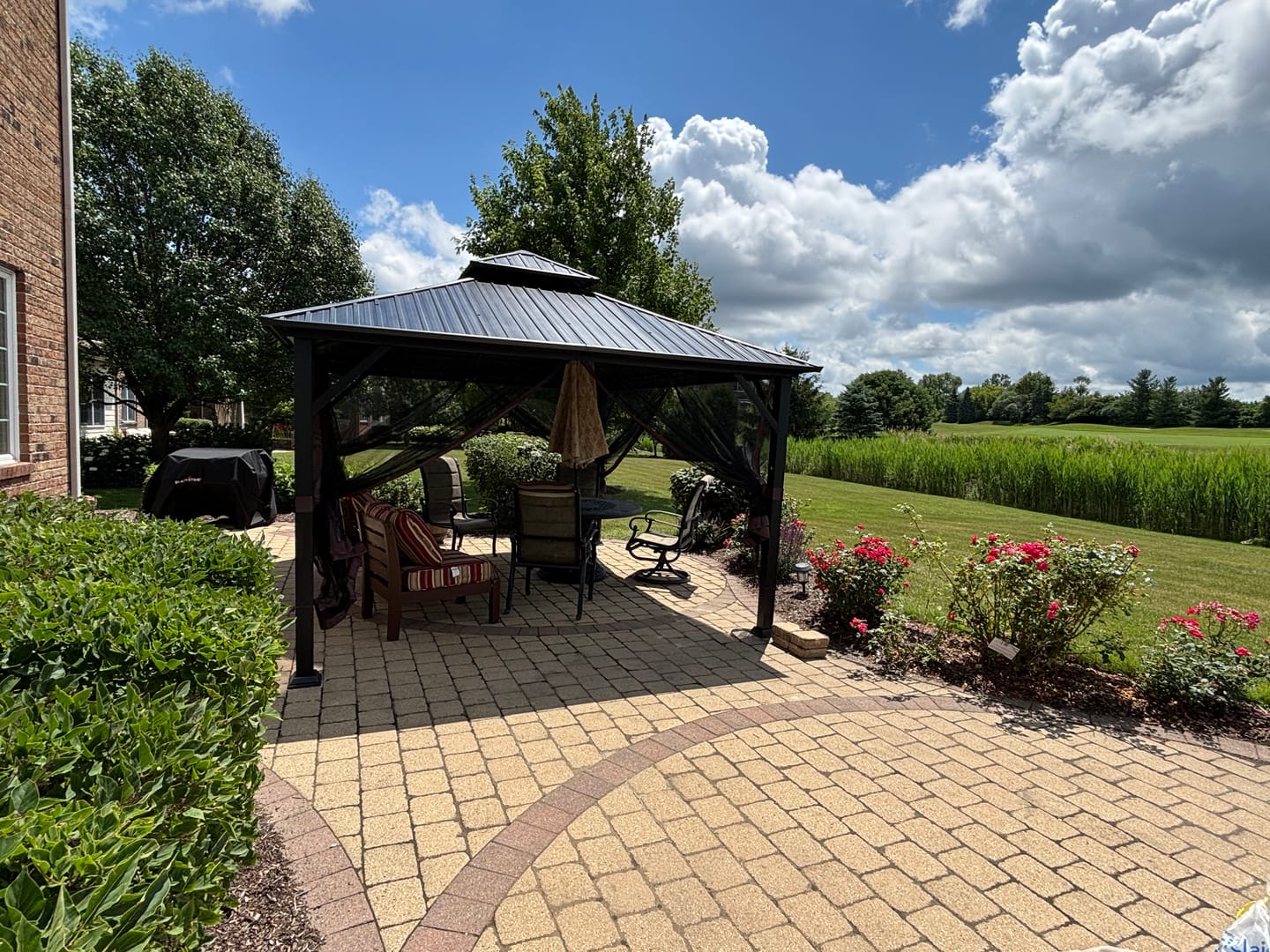 Customer photo review of Shade N' Shelters 12' x 14' Duncan Hardtop Gazebo with Mosquito Netting