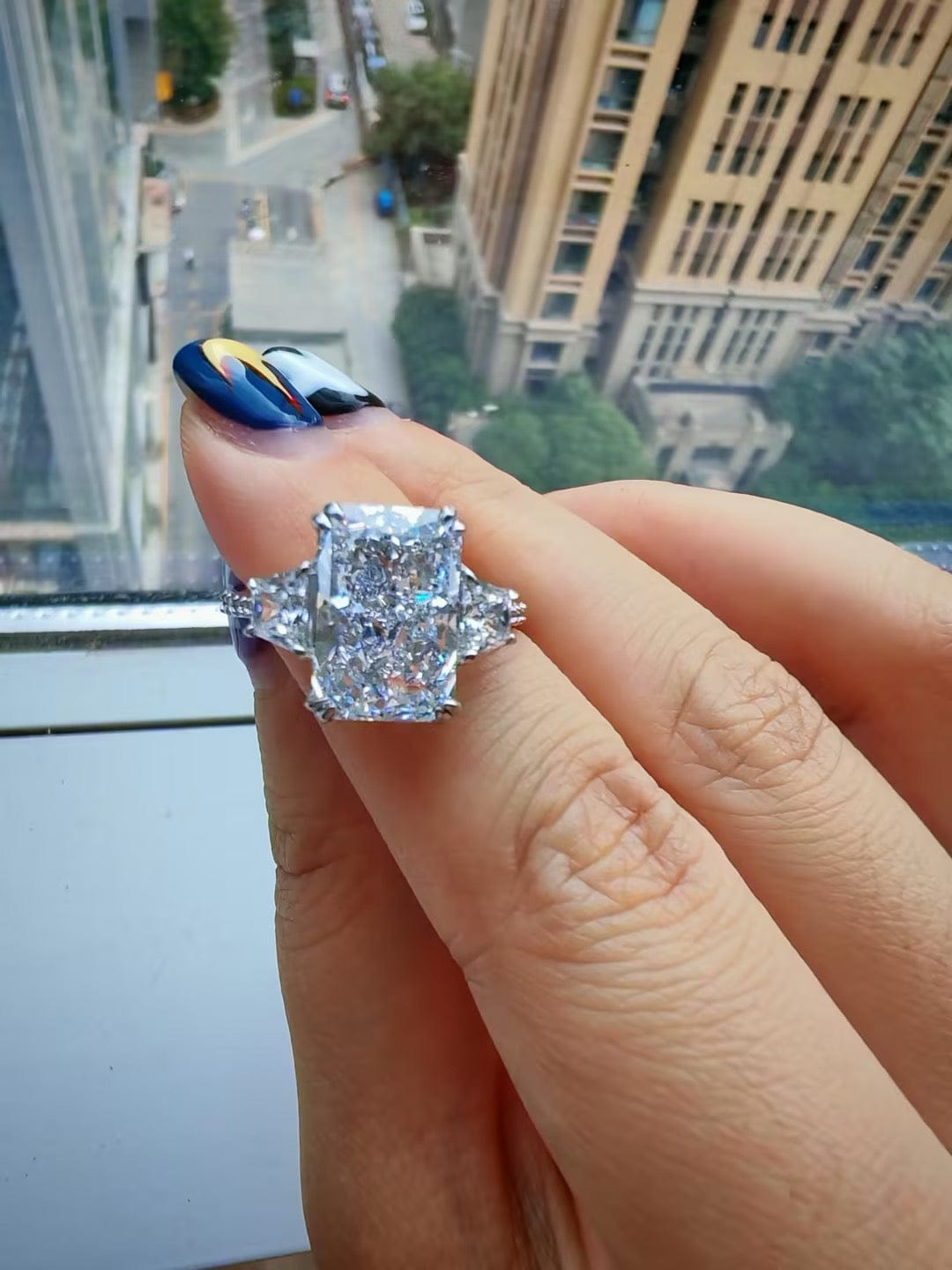 Customer photo review of Louily Gorgeous Three Stone Crushed Ice Radiant Cut Engagement Ring