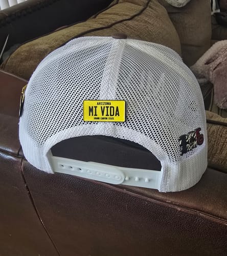 Customer photo review of Arizona Yellow License Plate Enamel Pin