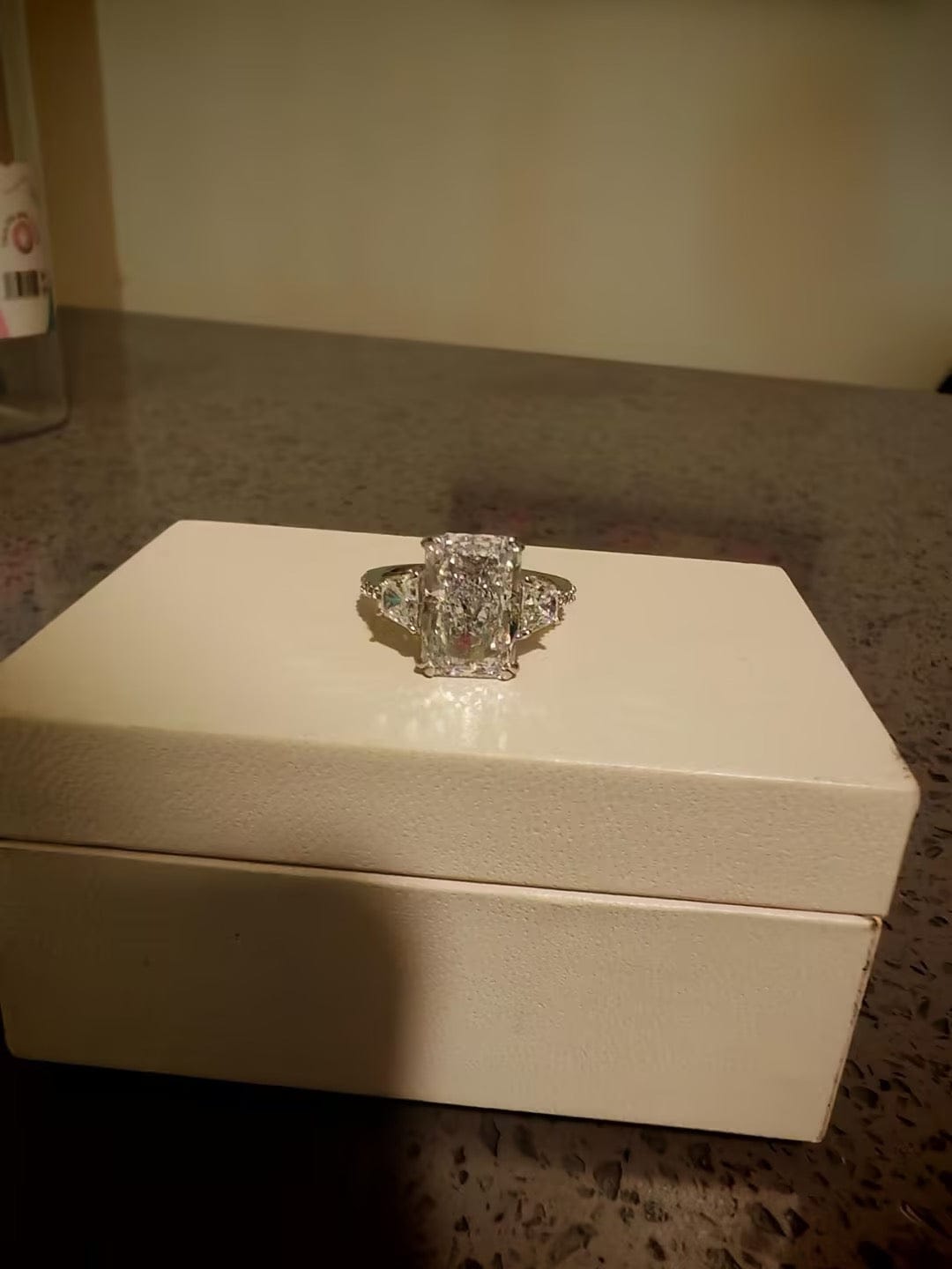 Customer photo review of Louily Gorgeous Three Stone Crushed Ice Radiant Cut Engagement Ring