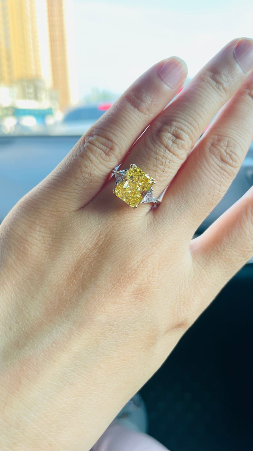 Customer photo review of S925 4.0Ct Radiant & Triangle Cut Yellow Stone Three Stone Engagement Ring In Sterling Silver