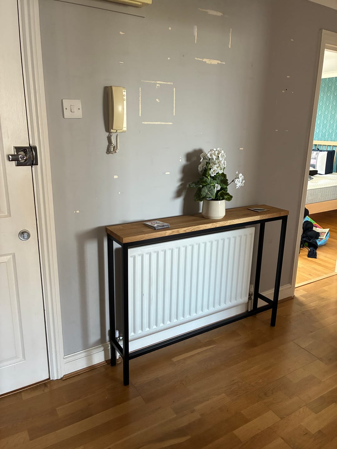 Customer photo review of Landon Oak Metal Console Radiator Cover Table