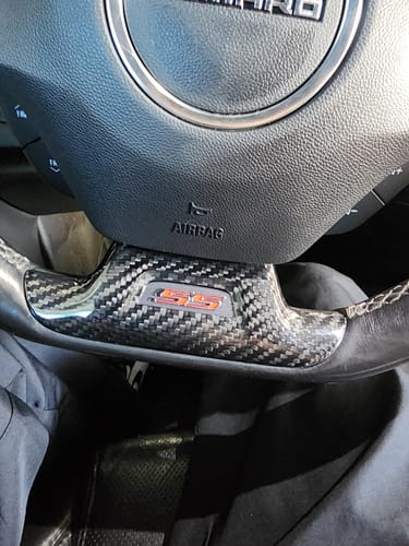 Customer photo review of 2016-2024 Camaro Carbon Fiber Lower Steering Wheel Emblem Trim Cover