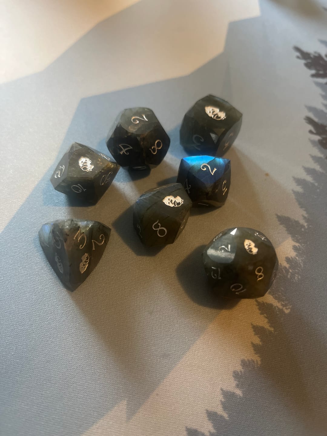 Customer photo review of URWizards D&D Multi-faceted Gemstone Engraved Dice Set