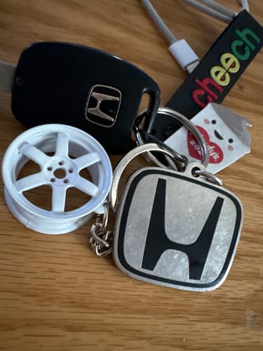 Customer photo review of TE Wheel Keychain