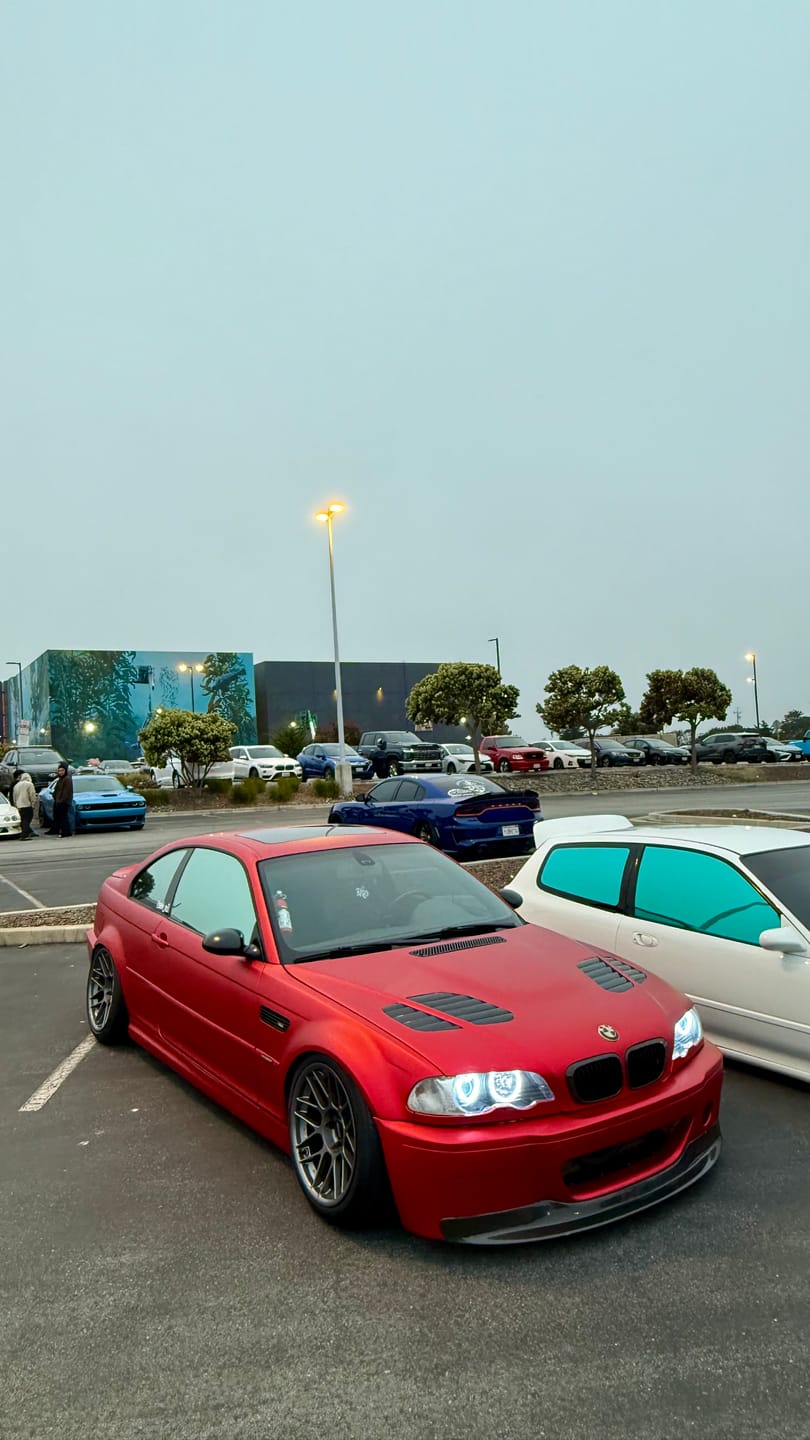 Customer photo review of Satin Chrome Prismatic Red Vinyl Wrap