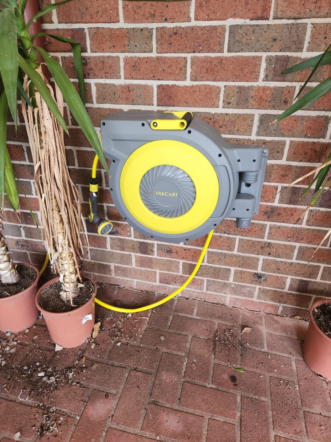 Customer photo review of 30m Retractable Garden Hose Reel.. Fully Installed