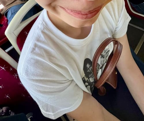 Customer photo review of after party baby tee