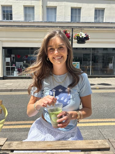 Customer photo review of roll the dice baby tee