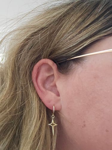 Customer photo review of Cross Drop Hoop Earrings
