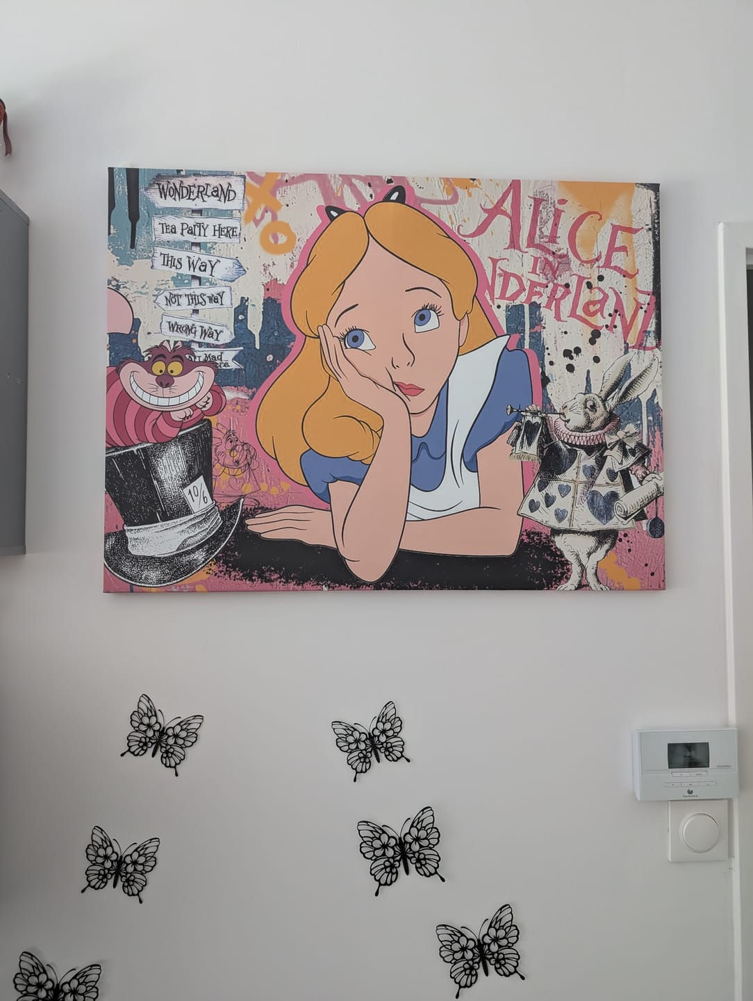 Customer photo review of Tableau Alice aux Pays des Merveilles - Déco Murale Design