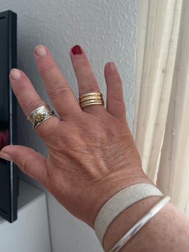 Customer photo review of Fidget Ring with Empowering Engraving Gold Plated