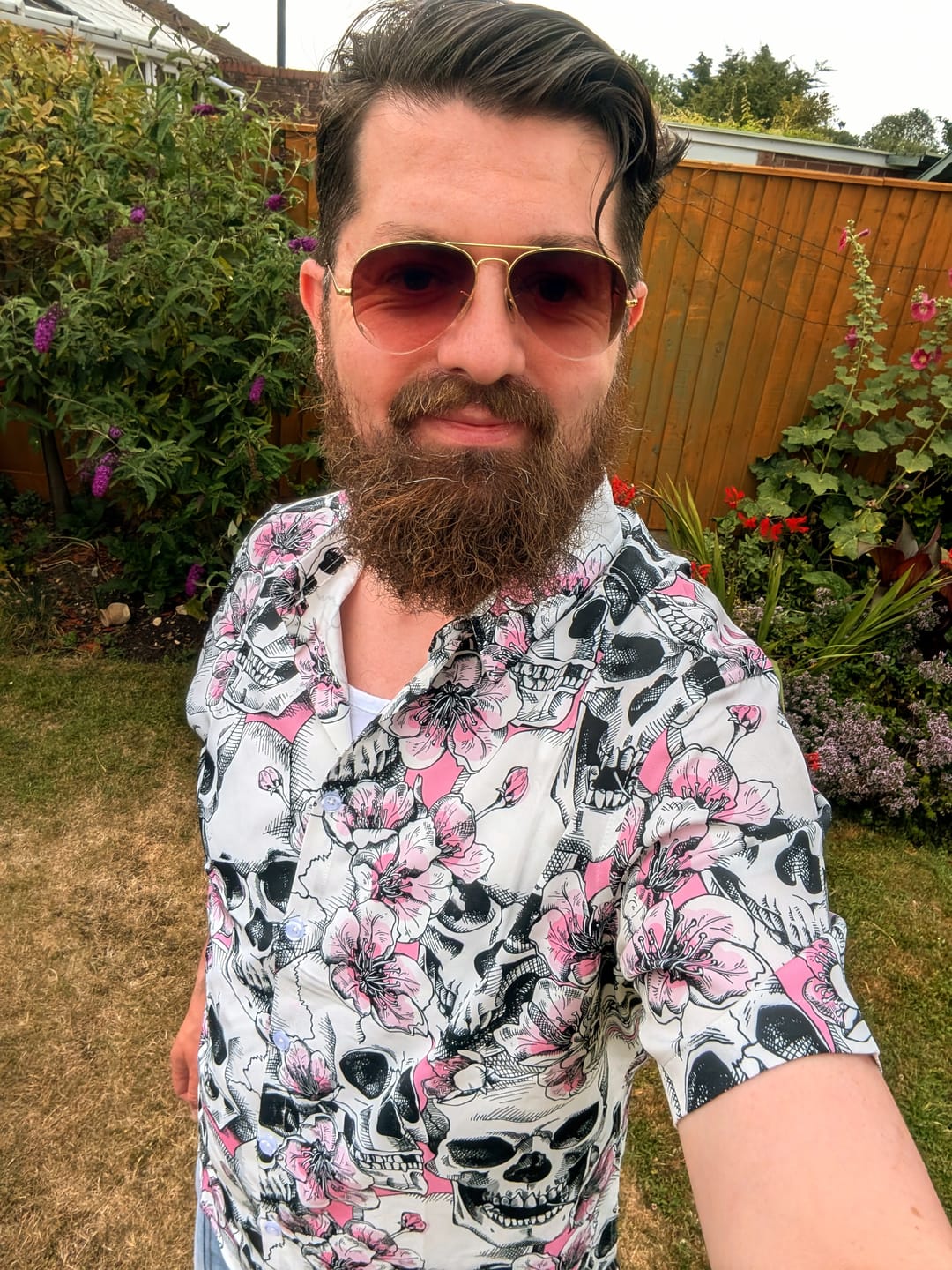 Customer photo review of Men's Skull Pink Flowers Button Up Short Sleeve Shirts
